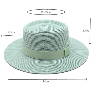 Close-up of mint green boater straw hat with ribbon and dimensions of 56-58cm