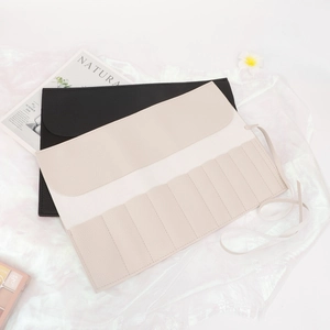 Portable PU leather makeup brush roll bag with litchi grain and 12 slots for storage