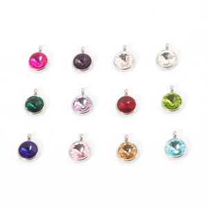 Grid display of twelve vibrant colorful round crystal birthstone charms for DIY jewelry