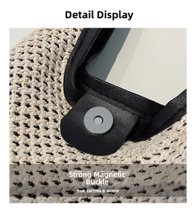 Close-up of a woven bag showing a strong magnetic clasp and black leather trim details