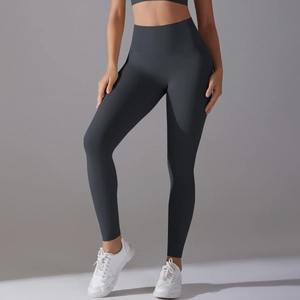 Close-up of high-waisted seamless charcoal grey yoga leggings with premium elastic fabric
