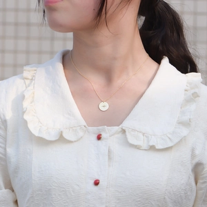 Minimalist S925 sterling silver gold coin necklace with star compass pendant on model