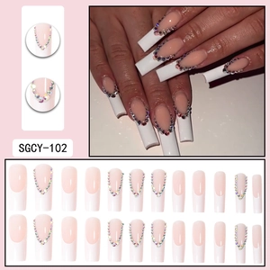 Long French press-on nails with white tips, colorful rhinestones, and 24pc square tips