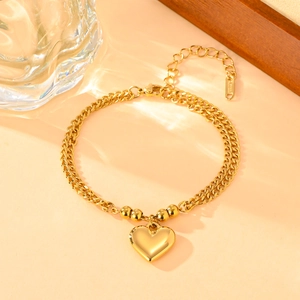 Bracelet double chaîne en acier inoxydable doré avec pendentif cœur poli et perles