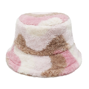 Detailed view of colorful plush fisherman hat with pink, white and brown faux fur texture