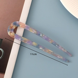 Detail shot of a 11cm U-shaped acetic acid hair pin with colorful marble texture