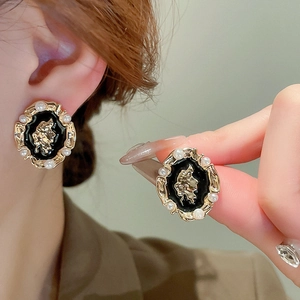 French vintage oval pearl earrings with gold embossed portrait and black enamel details