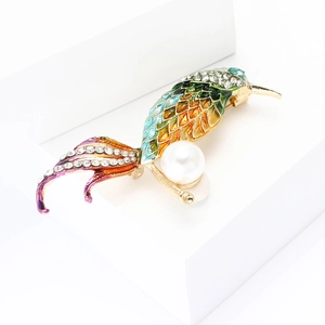 Exquisite alloy bird brooch with colorful enamel, rhinestones and pearl on a pedestal
