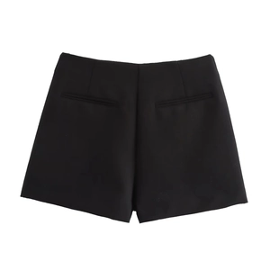 Rear view of black tailored shorts with decorative pockets and clean seam details