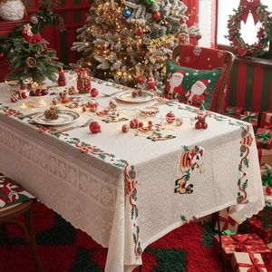 Christmas tablecloth with bells and reindeer embroidery featuring elegant lace edges