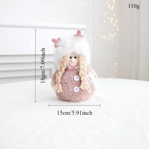 Detail of pink Christmas plush doll with retractable legs and knitted texture details