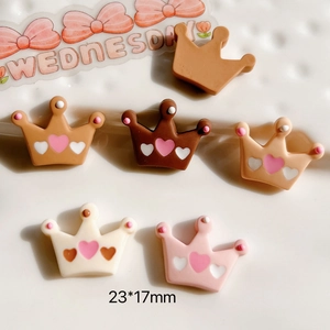 Macro shot of 23x17mm crown acrylic charms for DIY phone cases and hair accessories