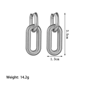 Detailed view of silver hoop earrings showing 3.5cm height and 14.2g weight specs