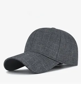 Detail of grey plaid baseball cap with warm crystal velvet lining and a curved brim