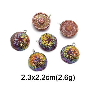 Macro view of iridescent fruit charms showing star embossing and 2.3x2.2cm dimensions
