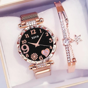 Women's rose gold starry quartz watch set with matching rhinestone star bracelet