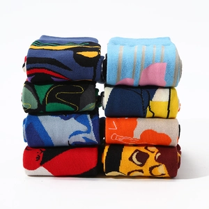 Eight pairs of abstract Picasso style combed cotton mid-tube socks with vibrant colorful prints