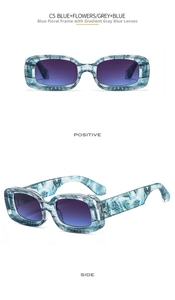 Close-up of rectangle sunglasses featuring a blue floral pattern frame and gradient lenses