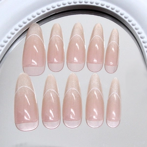 Cat eye press-on nails with white French gradient tips and almond shape design