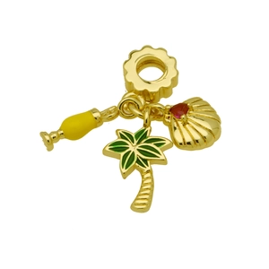 Detail of 18k gold plated charm featuring green enamel palm tree and seashell