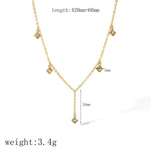 Detail of 18k gold-plated Y-necklace featuring five square-cut colorful cubic zirconia stones