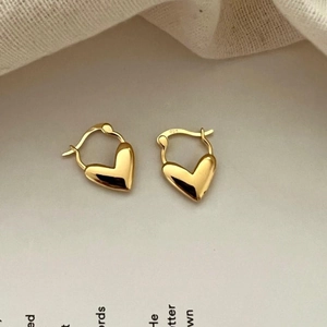 Elegant 925 sterling silver gold-plated heart hoop earrings with a high-polished finish
