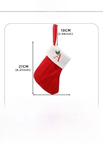 Detailed size chart for red knit Christmas stocking with letter A and holly embroidery