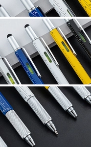 Detail of 6-in-1 multi-functional metal tool pen with ruler, level, and stylus tip