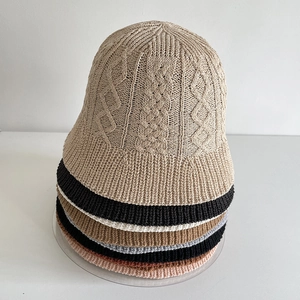 Detailed knit pattern on lightweight cotton linen bucket hats in six various colors