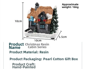 Detail view of resin Christmas house with dimensions 10x10x5.5cm and gift box packaging