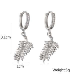 Detailed view of silver leaf earrings with cubic zirconia and exact size measurements