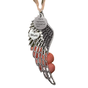 Silver angel wings ornament with engraved heart charm for Mum and sentimental message