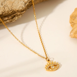 18K gold plated stainless steel necklace featuring evil eye pendant with clear crystals