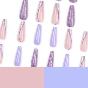Long coffin press-on nails in purple glitter and solid lavender with wavy line patterns