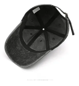 Detail of vintage washed cotton baseball cap lining with 100% cotton label and metal buckle