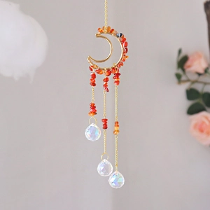 Handmade moon crystal suncatcher with red crushed stones and hanging crystal ball prisms