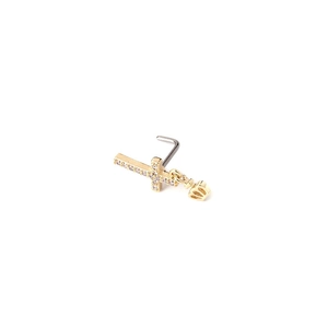 Detail of 20G gold titanium L-shaped nose stud with zircon cross and crown pendant