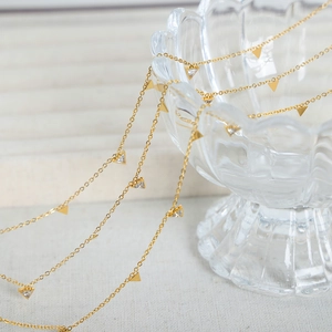 18K gold plated titanium necklace with minimalist triangle pendants and sparkling crystals