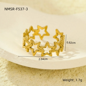 Macro detail of star cutout ring in 18K gold stainless steel with precise dimensions