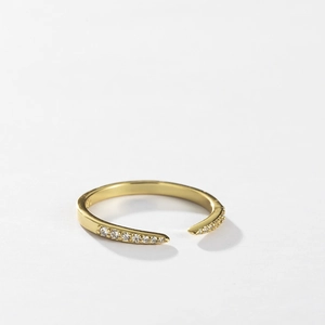 Detailed view of an adjustable S925 sterling silver gold ring with micro zircon inlays