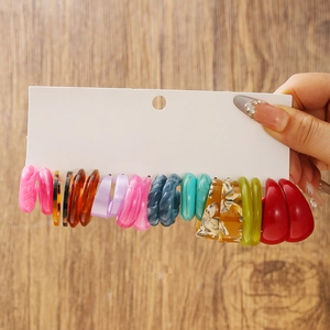 Lot de boucles d'oreilles créoles en résine acrylique colorée aux motifs marbrés variés