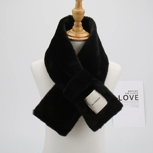 Elegant black faux fur scarf for women with a criss-cross design and decorative label