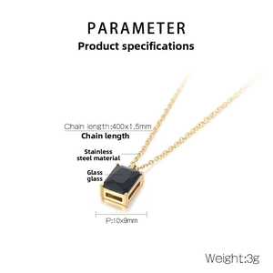 Macro shot of gold stainless steel necklace with 10x9mm square black glass pendant