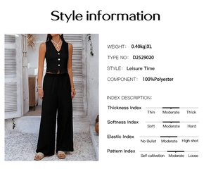 Detail view of the black V-neck vest and high-waisted wide-leg trousers set material