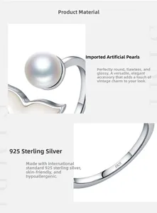 Macro detail of S925 sterling silver hallmark and glossy faux pearl earring base