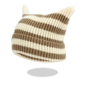 Detail of striped cat ear knit beanie featuring vertical ribbing and soft wool texture