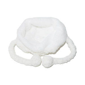 Detail of white plush earflap hat with fluffy texture and soft pom-pom decorations