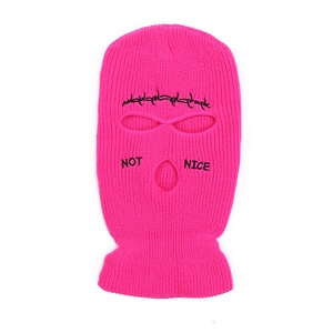 Pink three-hole knitted balaclava featuring black Not Nice embroidery and wire pattern