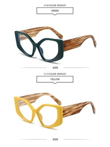 Detail view of stylish green and yellow cat-eye sunglasses with thick leopard temples