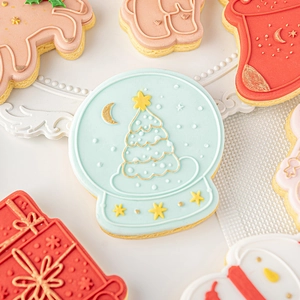 Christmas themed fondant cookie set with snowflake globe, deer and snowman shapes
